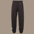 Scrunch leg sweat pants with the words "be kind studios" embroidered on the front.