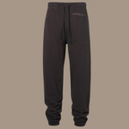 Scrunch leg sweat pants with the words "be kind studios" embroidered on the front.