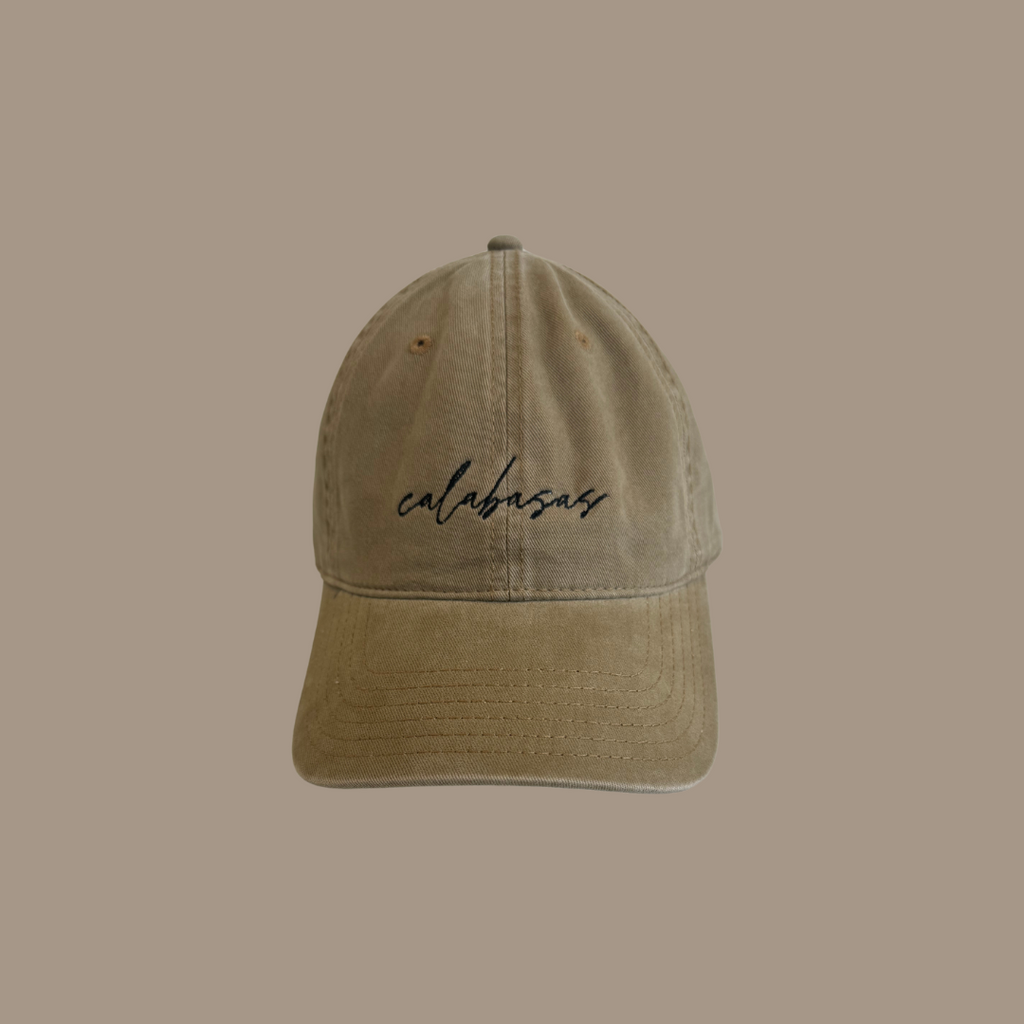Dad hat with the words "Calabasas" embroidered on the front.