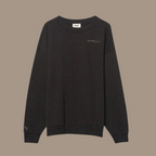 Oversized crew neck with the words "be kind studios" embroidered on the front.